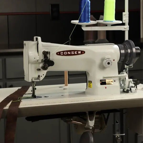 Consew 206RB-5 walking-foot upholstery sewing machine on a table, beige finish, 110V servo