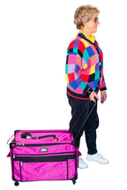 Tutto Large Pink machine bag on wheels with front pocket and retractable handle