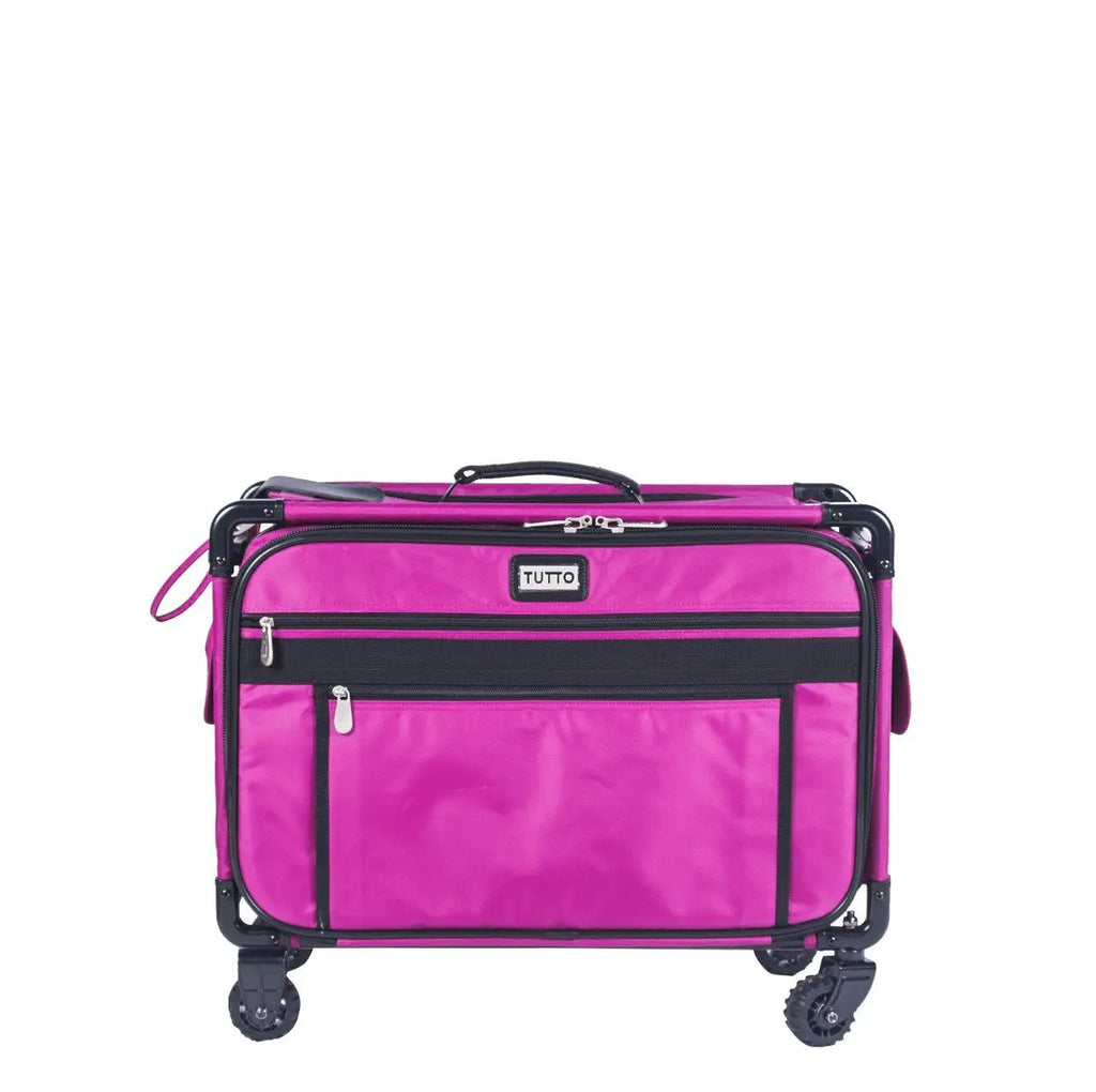 Tutto Large Pink machine bag with black trim, wheels, and zip pockets
