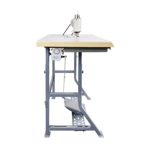 Consew 104-1T industrial sewing machine with beige table and gray metal stand, servo motor