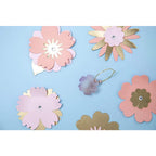Sizzix Bigz Die Bold Blossoms by Laura Kate cutting dies; pastel pink and gold flower shapes
