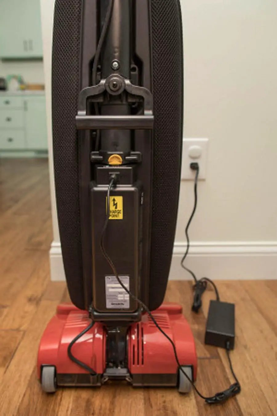 Simplicity S10CV Freedom cordless upright vacuum with red base and black body