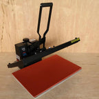 Ricoma high pressure heat press with red platen, digital control panel, and black frame