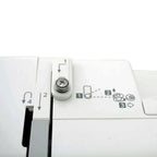 Janome DC2019 computerized sewing machine with free bundle package, white body, top-view of bobbin area