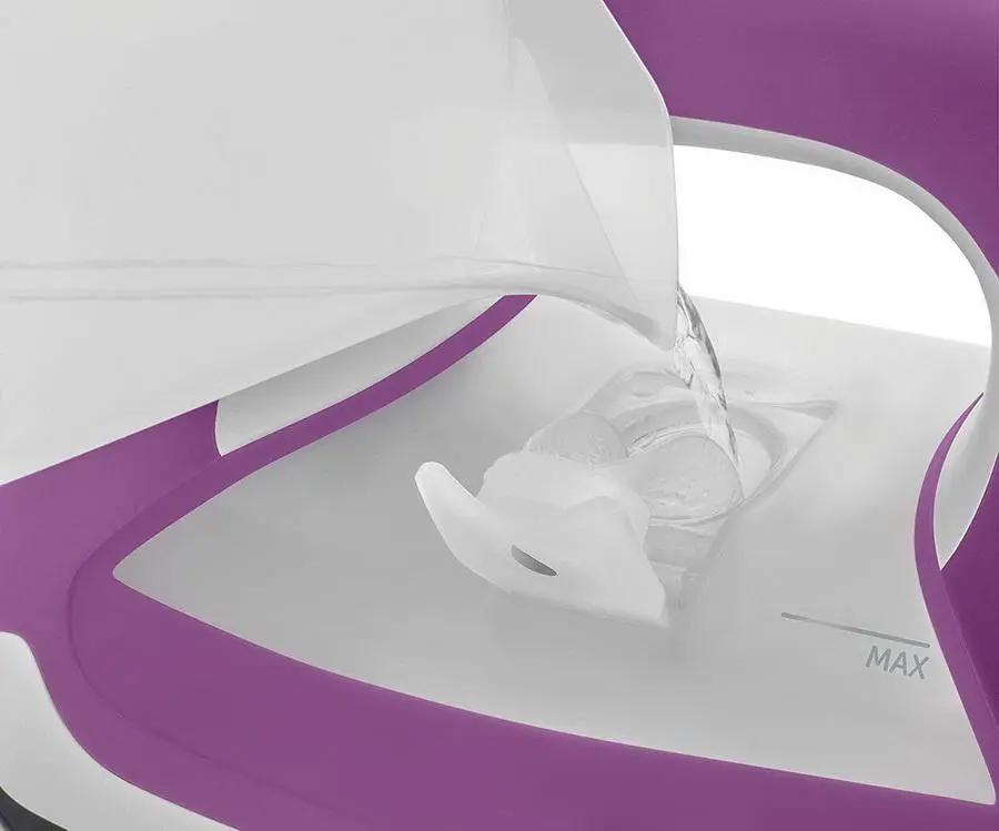 Oliso Ultra-Precision Steam Iron TG1100-P purple, close-up of white soleplate and purple body