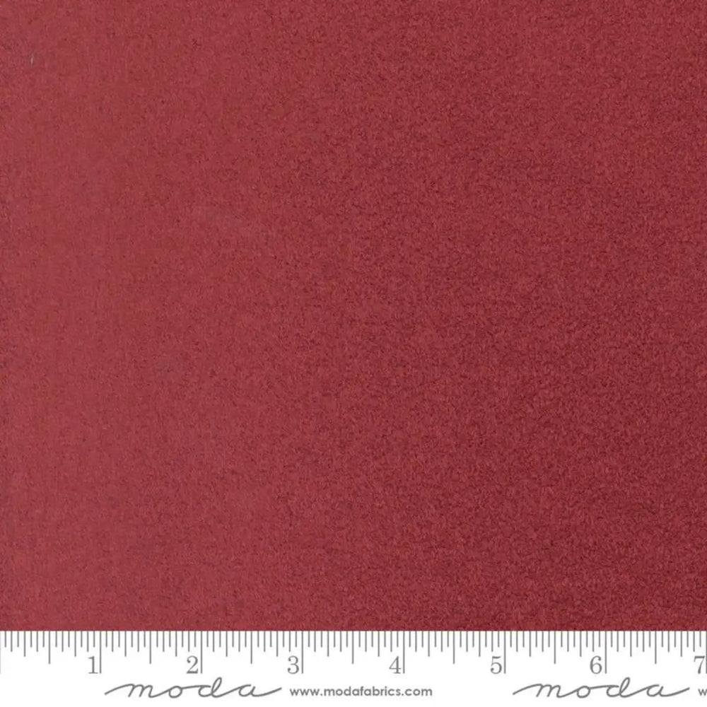 Fireside Burgundy 60-inch wide polyester fabric with a soft plush textured surface by Moda Fabrics.