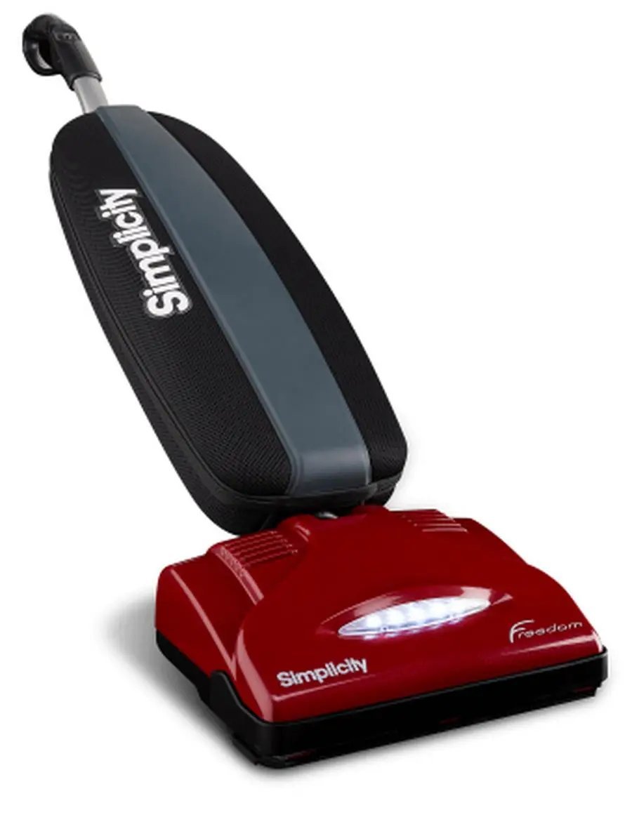 Simplicity S10CV Freedom cordless upright vacuum, red body with black/gray handle.