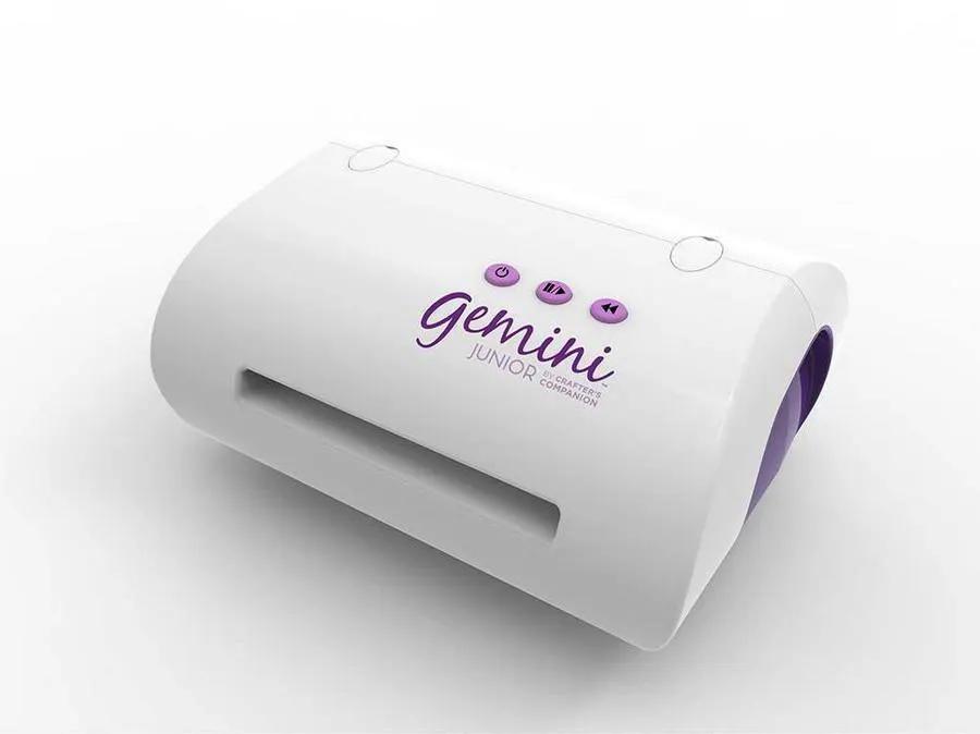 Gemini Junior cutting and embossing machine by Gemini, white body with purple control buttons.