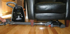 SEBO AIRBELT K3 Premium canister vacuum with ET-1 power head and parquet brush, black on hardwood floor.