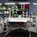 Handi Quilter HighLight 2 5' lighting frame in quilting studio with white metal construction