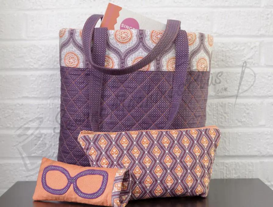 Singer bag set with purple quilted tote and two geometric-pattern zip pouches