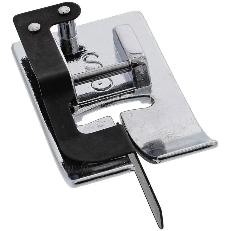 Quilting presser foot accessory from a sewing machine kit; chrome metal foot with black mounting piece.