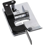 Quilting presser foot accessory from a sewing machine kit; chrome metal foot with black mounting piece.