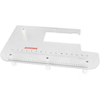 Janome Quilting Accessory Kit, white plastic ruler base with 0–15 inch scale and JANOME logo
