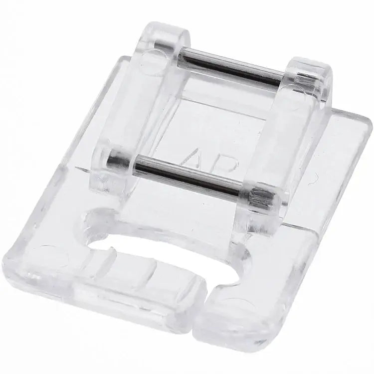 Janome quilting accessory kit component in clear acrylic; compact sewing machine attachment