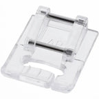 Janome quilting accessory kit component in clear acrylic; compact sewing machine attachment