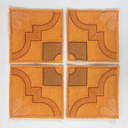 DIME Monster Block Maker - Single Needles Only; four orange squares with black geometric stitching.