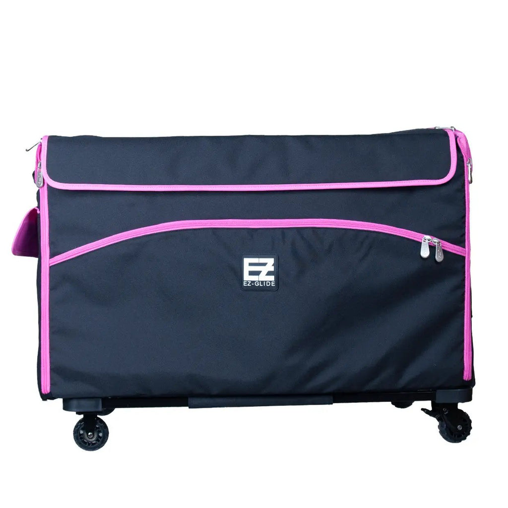 29in EZ-Glide Trolley machine bag in black with pink trim on wheels by Tutto