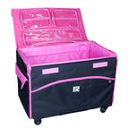 29-inch EZ-Glide trolley machine bag, black with pink interior and clear lid pockets; EZ-Glide logo visible.