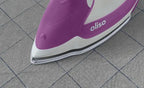 Oliso Ultra-Precision Steam Iron TG1100-P purple on tiled floor