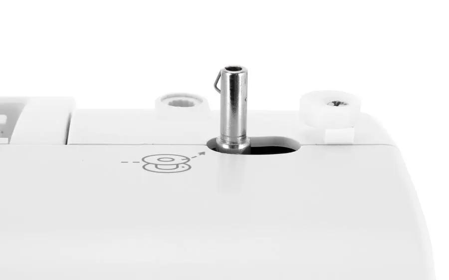 Singer sewing machine with white body; close-up of silver bobbin post and spool pin hardware