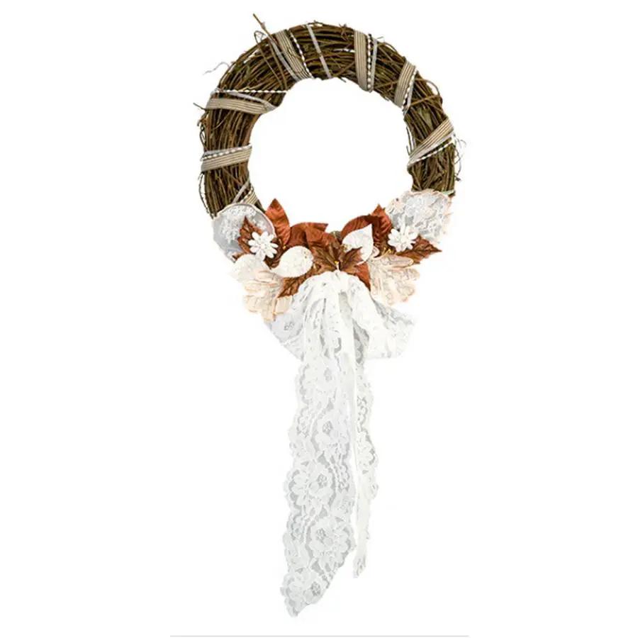 Anita Goodesign vintage free-standing leaves embroidery design featuring a brown vine wreath with white lace ribbon