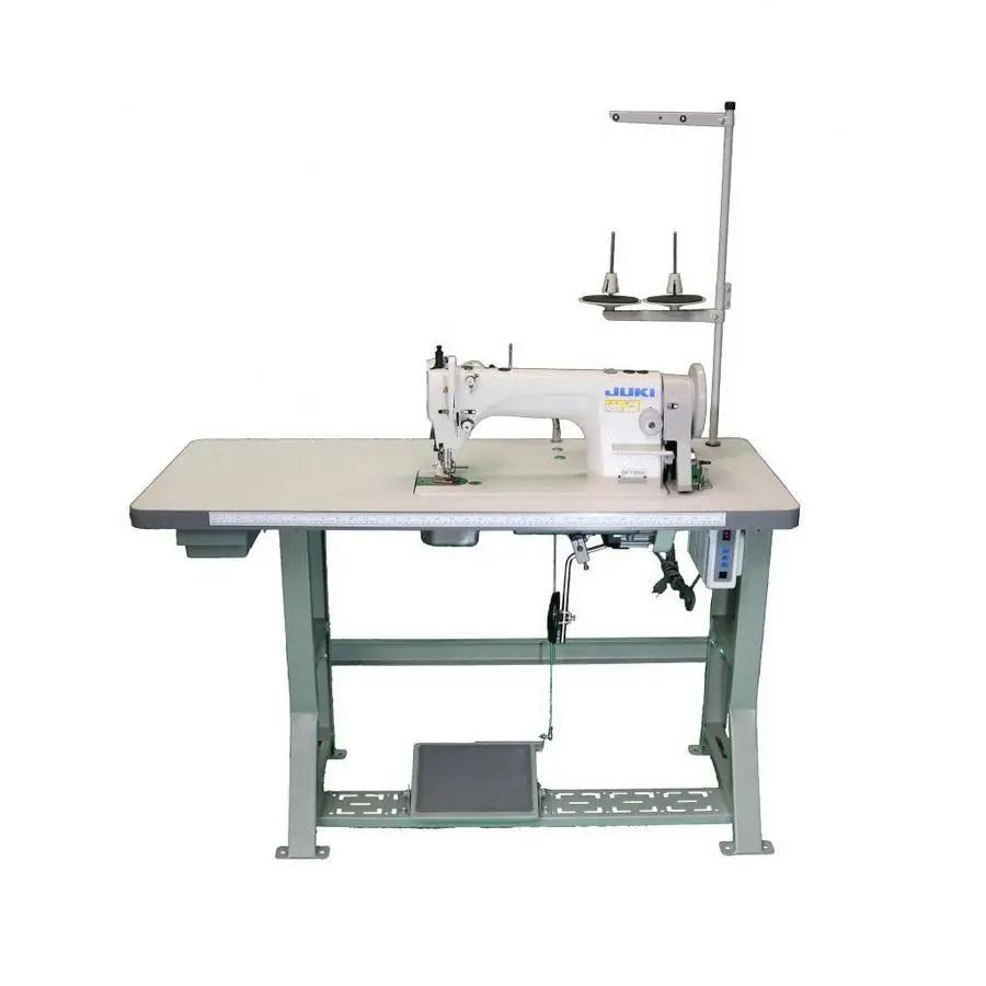 Juki DU-1181N walking-foot industrial sewing machine on a gray metal table with a vertical dual-spool thread stand