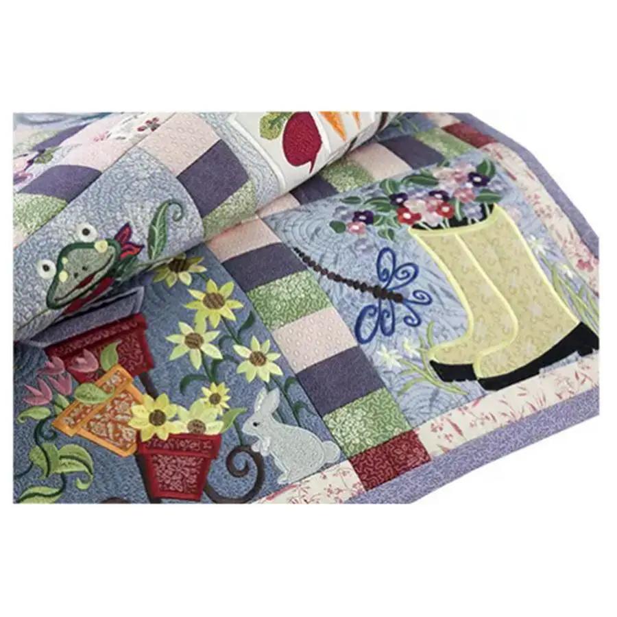Anita Goodesign Time in a Garden sewing patterns collection, colorful quilt blocks with frog, flowers, and boot motif.