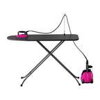 Laurastar Lift Plus Iron with pink accents and pink base unit on a black ironing board
