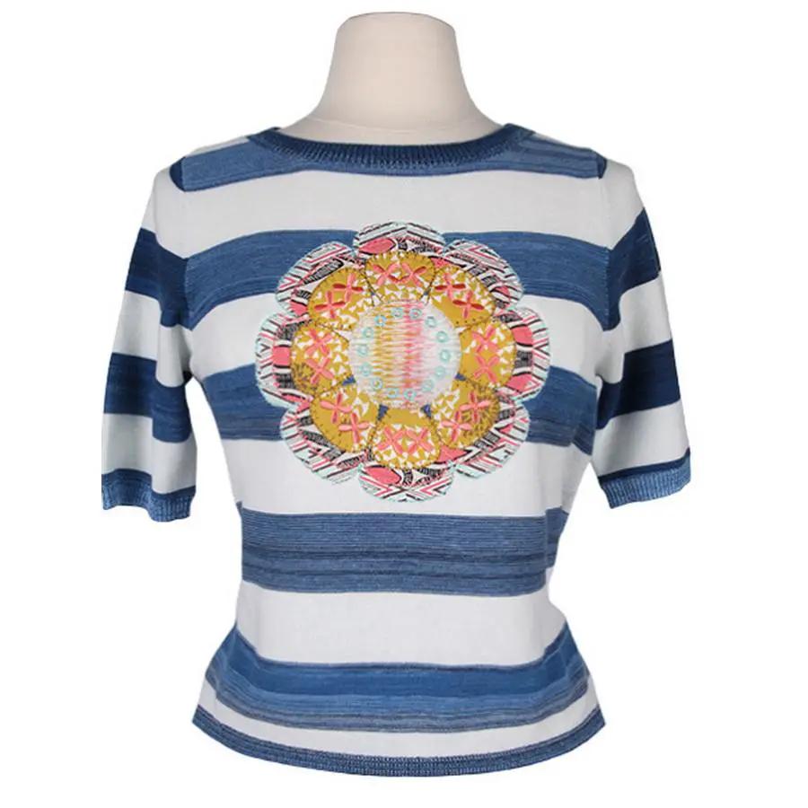 Anita Goodesign Blanket Stitch Animals sewing pattern; blue striped knit top with large colorful flower applique