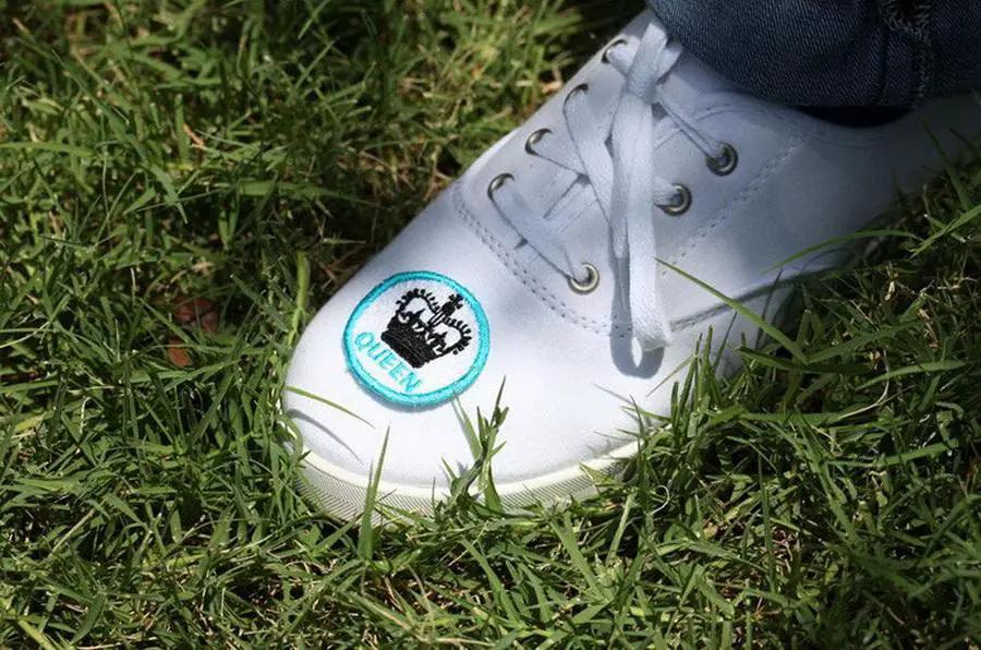 Stabilizer bundle: white sneaker with turquoise-bordered crown patch on toe