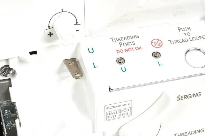 Baby Lock Serenity 4-Thread Serger sewing machine front panel in white with threading ports