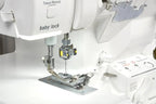 Baby Lock Serenity 4-Thread Serger, white machine with visible threading area