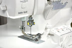 Baby Lock Serenity 4-Thread Serger sewing machine, white with metal presser foot and threading knobs