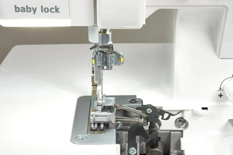 Baby Lock Serenity 4-Thread Serger sewing machine, white body with exposed needle area.