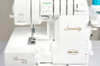 Baby Lock Serenity 4-Thread Serger, white sewing machine with gold script logo and Revolution Air threading