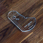 Baby Grand Quilting Ruler by Handi Quilter, clear acrylic piano-shaped quilting tool.