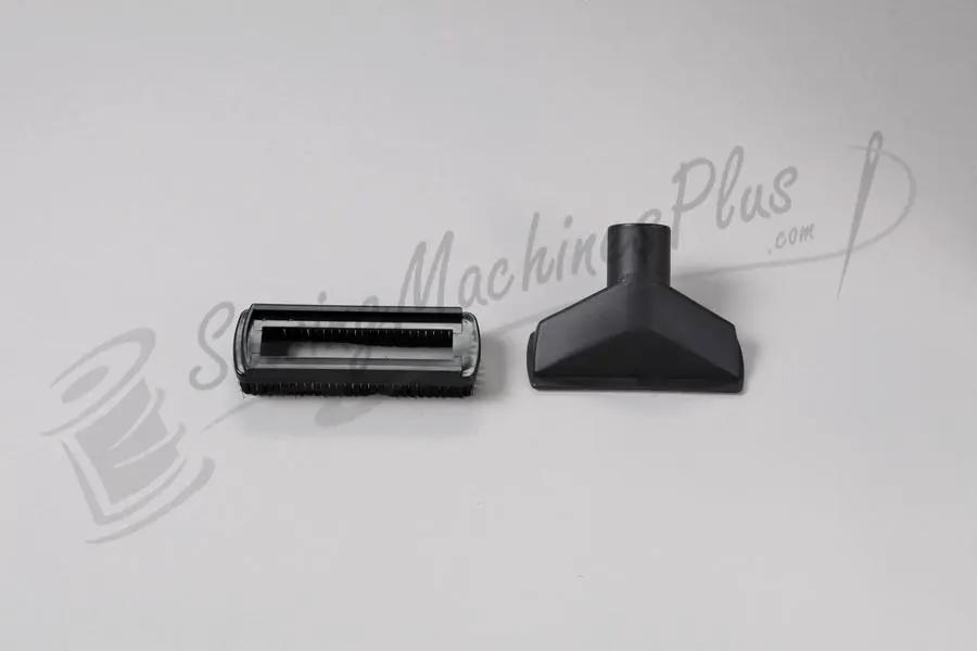 Two canister vacuum attachments by The Bank: floor brush head and wide nozzle, black