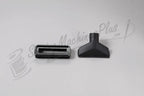 Two canister vacuum attachments by The Bank: floor brush head and wide nozzle, black
