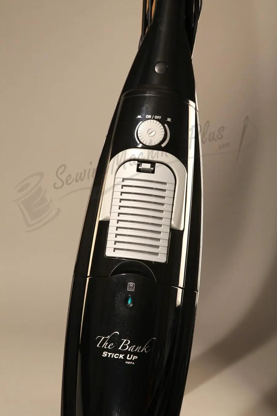 The Bank Stick Up HEPA hard-floor vacuum cleaner, black with white vented intake