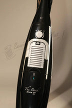 The Bank Stick Up HEPA hard-floor vacuum cleaner, black with white vented intake