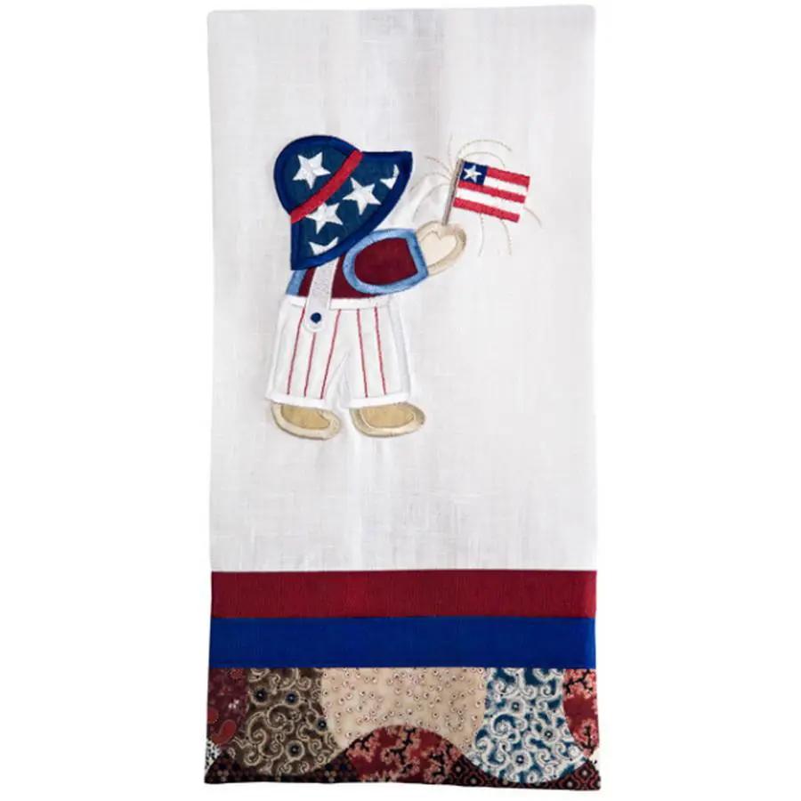 Anita Goodesign Sunbonnet Sue and Sam embroidery design on white towel with red and blue border and patchwork bottom