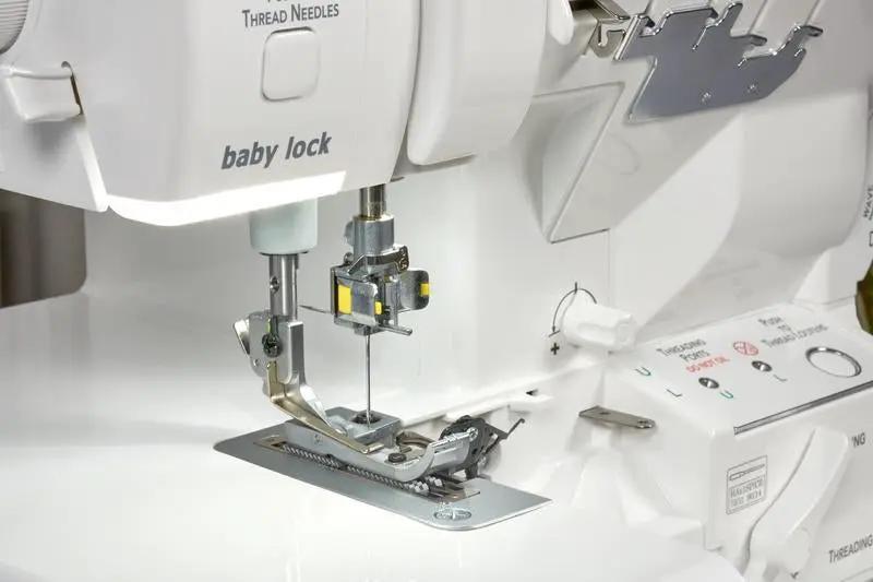Baby Lock Serenity 4-Thread Serger, white finish with metal presser foot and thread guides.
