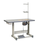 Reliable SewQuiet 6050SM servo motor mounted under a gray sewing table with foot pedal