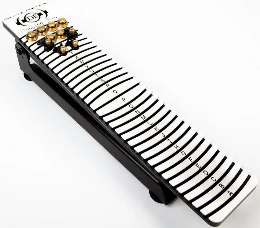 Hooping Pro Station by Durkee in black with curved white A–Z lettered tabs and gold knob controls.