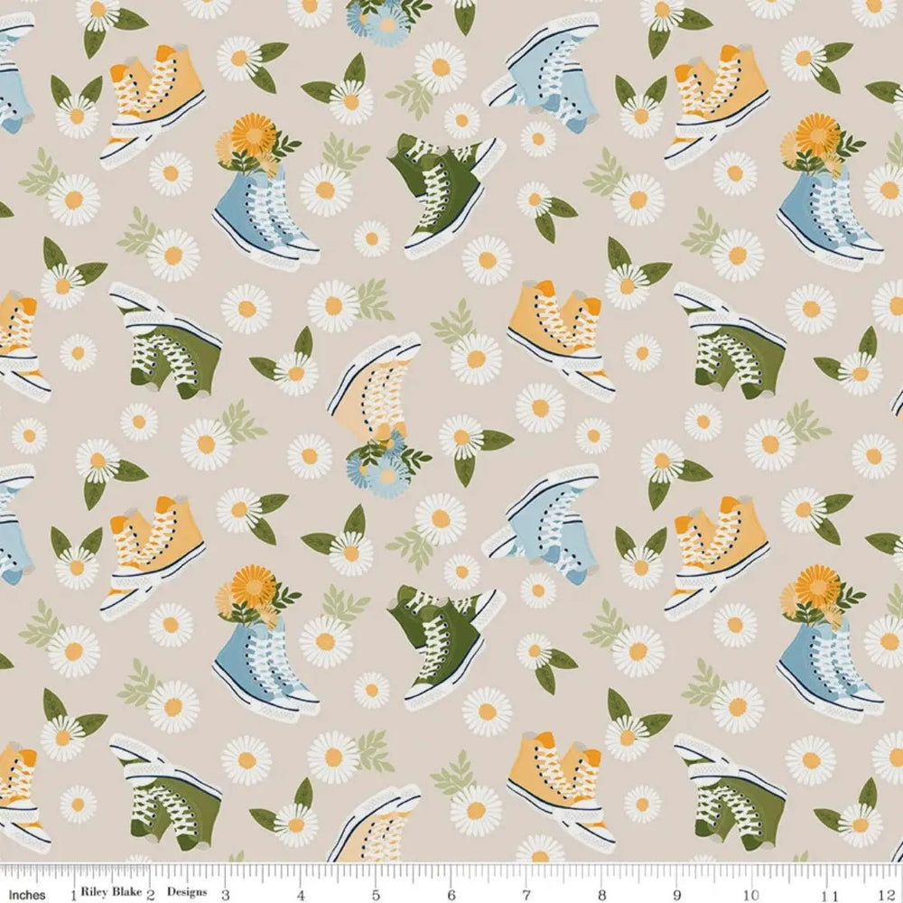 Sunshine & Dandelions Shoes Cream quilting fabric with colorful high-top sneakers, daisies, and leafy accents by Traci Reed for Riley Blake Designs