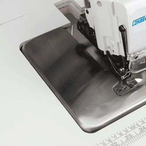 Consew CM793 serger with metal extension table and visible brand logo