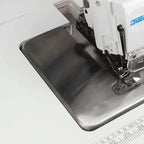 Consew CM793 serger with metal extension table and visible brand logo