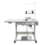 Consew CM793 serger with assembled table and servo motor on white metal frame with thread spools