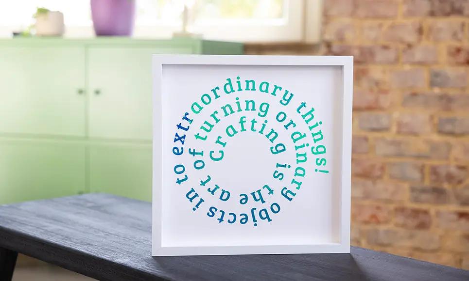 Brother Bellissimo CT1 cutting machine framed art piece with teal circular typography